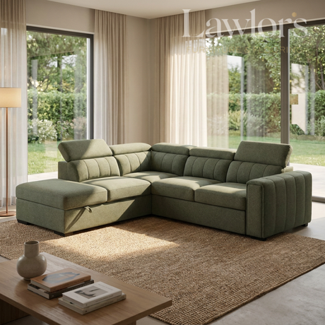 Green sectional LHF sofa bed in a modern living room with large windows