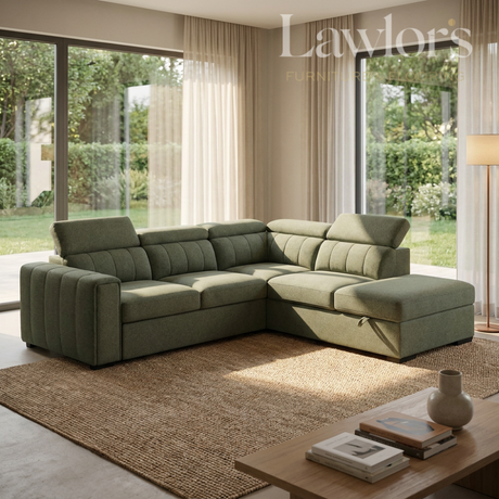 Green sectional RHF sofa bed in a living room with large windows