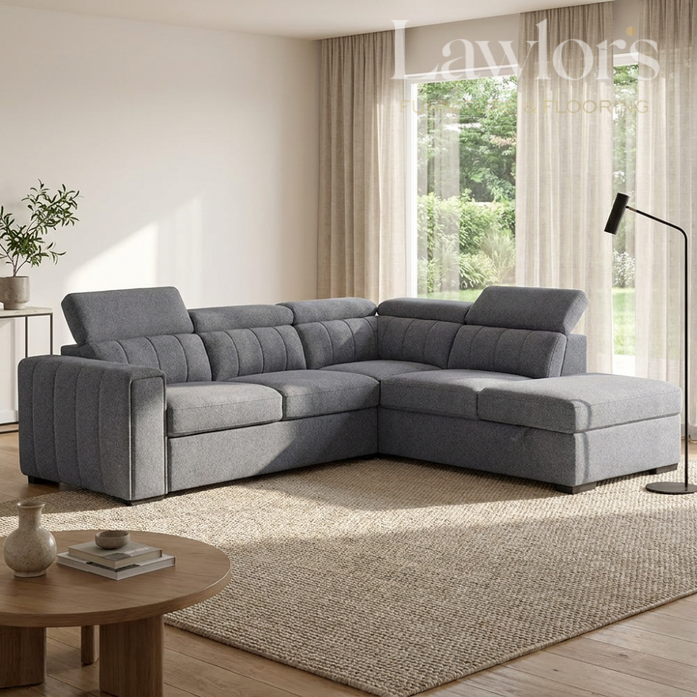 Grey sectional RHF sofa bed in a living room