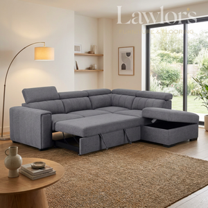 Grey sectional opened RHF sofa bed in a living room