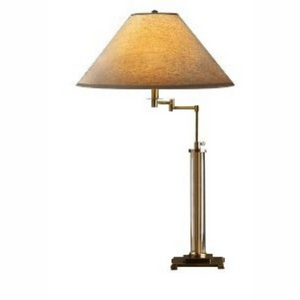 The tapered fabric shade of the 75cm antique brass Annery Table Lamp offers delicate lighting that is ideal for any desk, living area, or bedside.
