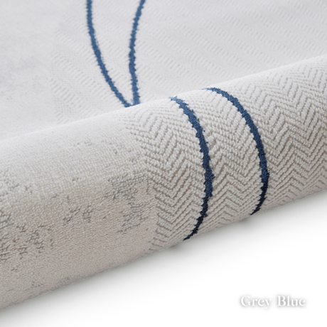 Introduce fresh style with the Apollo Modern Abstract Machine Made Rugs featuring a blend of bold designs, metallic yarn and soft multi textured pile.