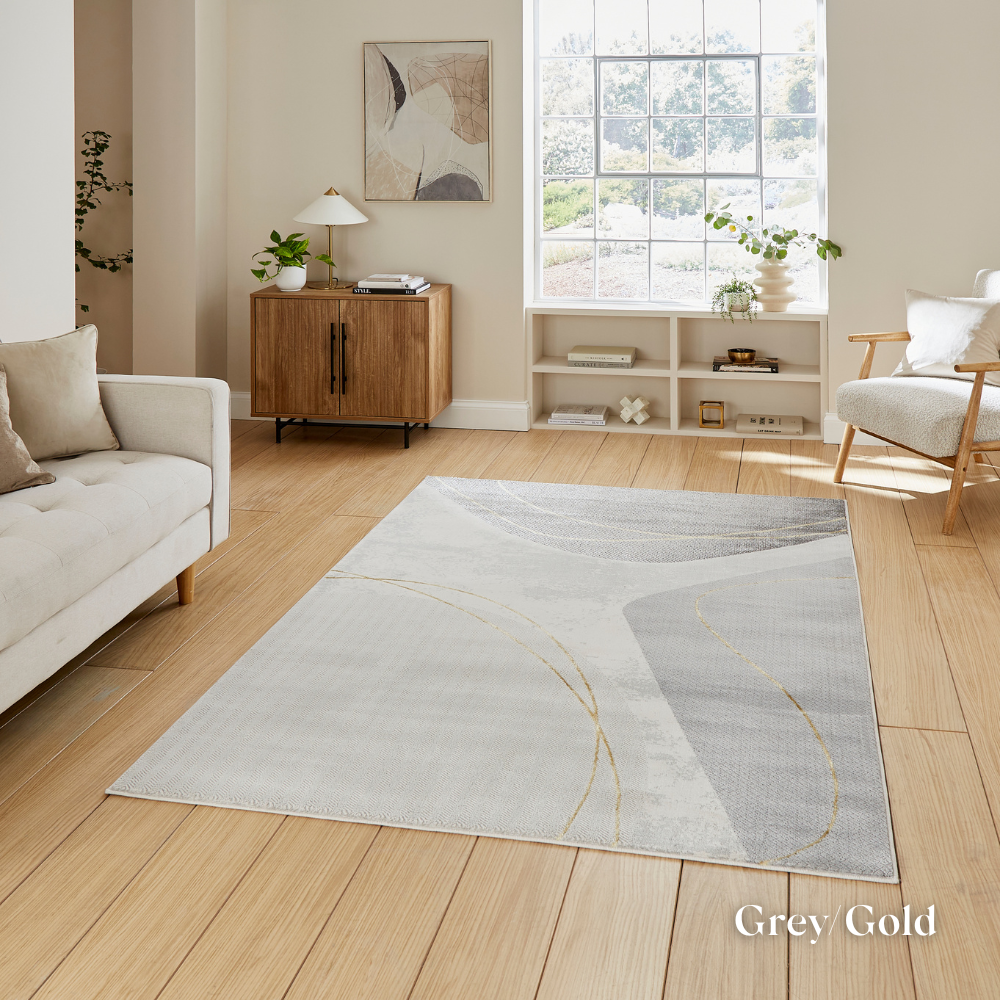 Introduce fresh style with the Apollo Modern Abstract Machine Made Rugs featuring a blend of bold designs, metallic yarn and soft multi textured pile.