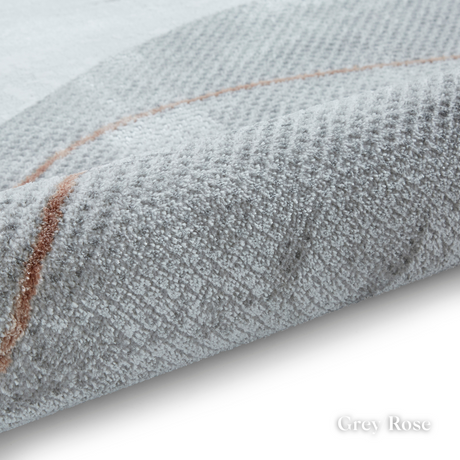 Introduce fresh style with the Apollo Modern Abstract Machine Made Rugs featuring a blend of bold designs, metallic yarn and soft multi textured pile.