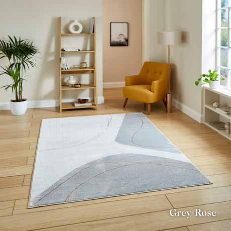 Introduce fresh style with the Apollo Modern Abstract Machine Made Rugs featuring a blend of bold designs, metallic yarn and soft multi textured pile.