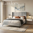 Alrington Bedframe in Grey with a modern vertical panel headboard, soft upholstered frame and sleek legs.