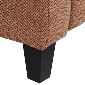 Brown textured fabric with a black leg on a white background