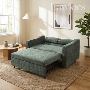 Green sectional opened sofa bed in a living room