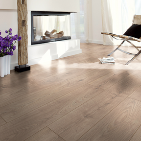 The Atlas Oak Beige Laminate Flooring - 12mm features AC5-rated durability, realistic oak finish and 5G Click installation.