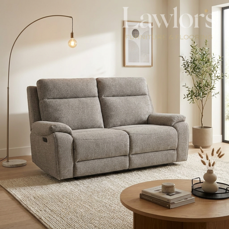 Grey 3 seater recliner sofa in a living room setting