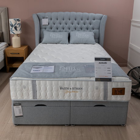 The Eclipse Fabric Headboard - 56" features arched winged with deep buttons, custom fabric and floor standing with chrome gliders, ideal for any bed!