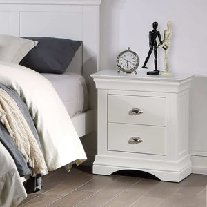 The Bella Bedside Locker features solid pine, white lacquer finish, elegant design with ample storage.