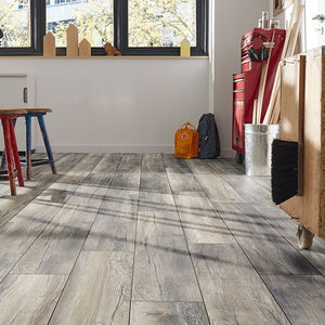 Barn Oak Laminate 8mm: Rustic wide plank, AC4 rated for durability, 5G click system for easy installation, 25-year residential warranty, and underfloor heating compatible