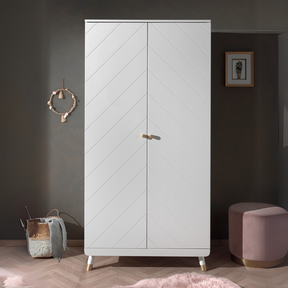 The Billy 2 Door Wardrobe in Satin White with golden accents and 2 door cabinet offers ample clothing storage door any stylish baby or children's room