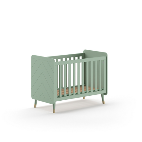 The Billy Baby Cot Bed in Olive Green features a geometric graphic design, golden accents and an adjustable slatted base, perfect for a modern nursery setup