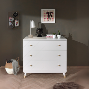 The Billy Chest of 3 Drawers in Satin White features golden accents & 3 spacious drawers, a changing care table with ample storage space for baby essentials