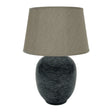 The Blue Waves Lamp is stunning showcase of traditional craftsmanship, crafted from ceramic and taupe linen shade