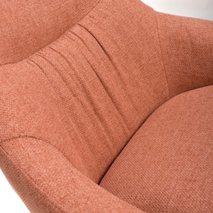 The Boden Bar Chair in Sage Green, Natural or Brick offers luxurious fabric comfort, chic pleated details, robust black metal legs