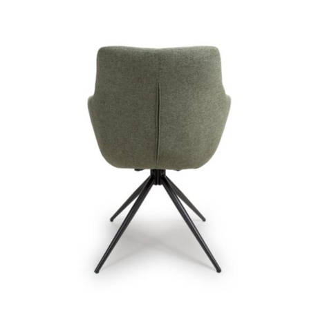 The Boden Carver Chair in Sage Green blends modern style with comfort, plush fabric upholstery, sleek metal legs
