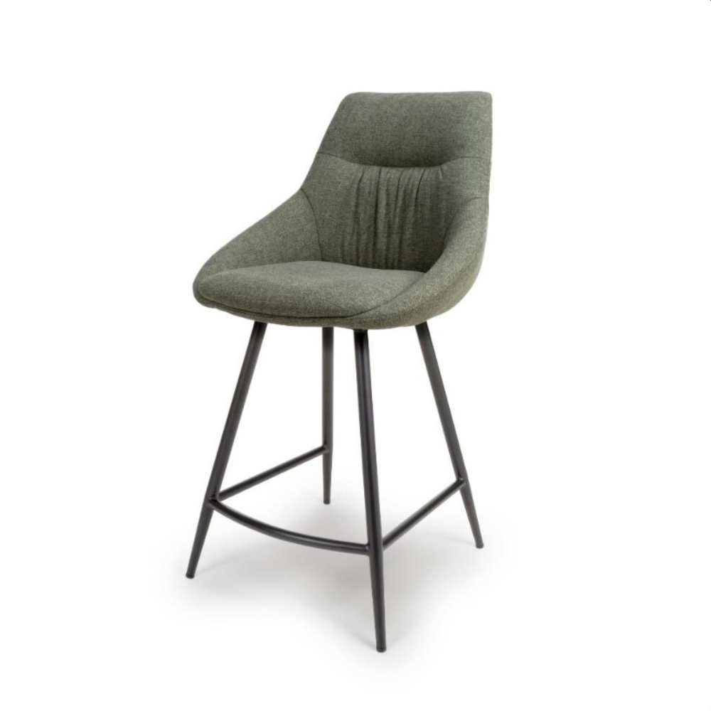 The Boden Counter Chair in Natural, Sage Green and Brick features soft upholstery, sophisticated pleats and strong black metal legs