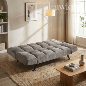 Grey sofa bed in a living room setting