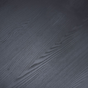 The Boston Coffee Table in Black Ash boasts a SmarTops® surface, robust iron legs and a generous design, making it as a practical and elegant addition.