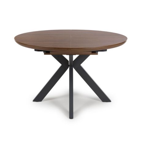 The Boston Extending Table, which can be adjusted from 1200 to 1600mm, showcases a luxurious smoked oak veneer, robust metal legs and a seamless extension