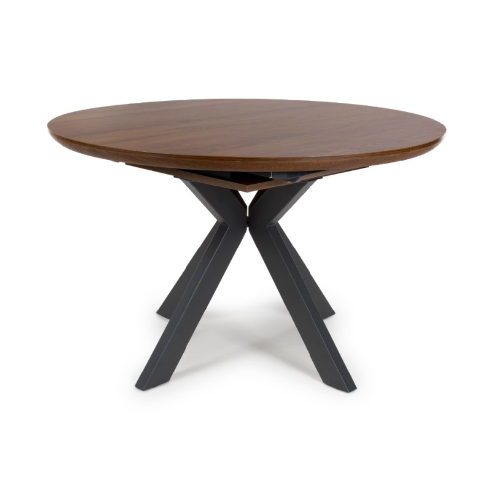 The Boston Extending Table, which can be adjusted from 1200 to 1600mm, showcases a luxurious smoked oak veneer, robust metal legs and a seamless extension