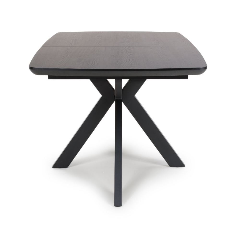 The Boston Extending Table, which ranges from 1400 to 1800mm, showcases a striking black ash veneer, robust metal legs, and a seamless extension mechanism.