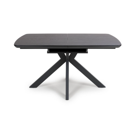 The Boston Extending Table, which ranges from 1400 to 1800mm, showcases a striking black ash veneer, robust metal legs, and a seamless extension mechanism.