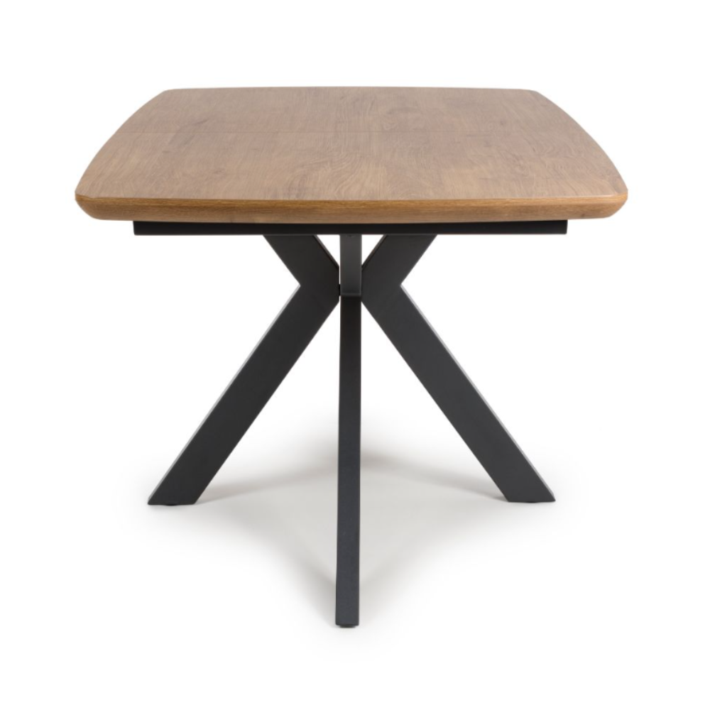 The Boston Extending Table, with a range of 1400-1800mm, features a charming rustic oak veneer, robust metal legs and an expandable surface.