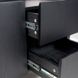 The Boston Sideboard in Black Ash boasts a SmarTops® resilient surface, elegant iron legs, and generous storage capacity.