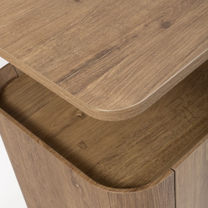 The Boston Sideboard in Rustic Oak showcases a SmarTops® resilient surface, elegant iron legs, and generous storage capacity.