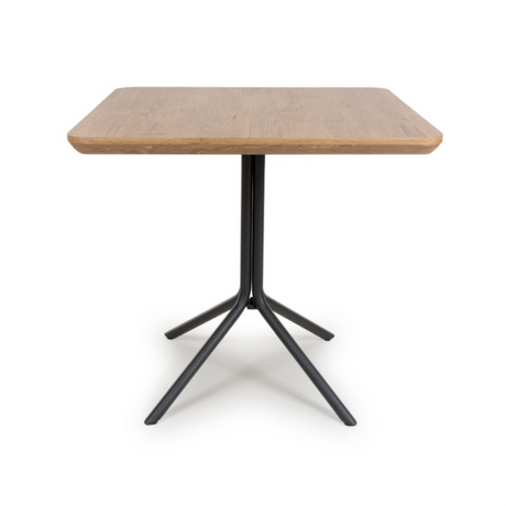 The Boston Square Table 800 x 800mm in Rustic Oak, showcases a cozy oak veneer surface paired with a robust metal base, ideal for dining environments.