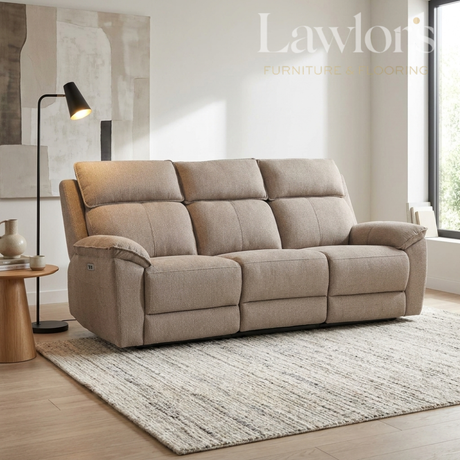 Beige 3 seater electric recliner sofa in a living room setting