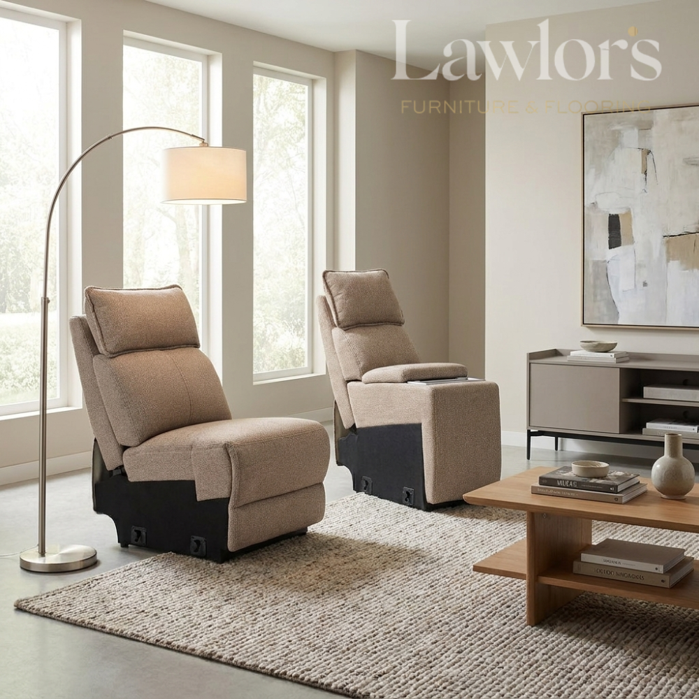 Living room with beige armless and console sectionals, a lamp, and a coffee table
