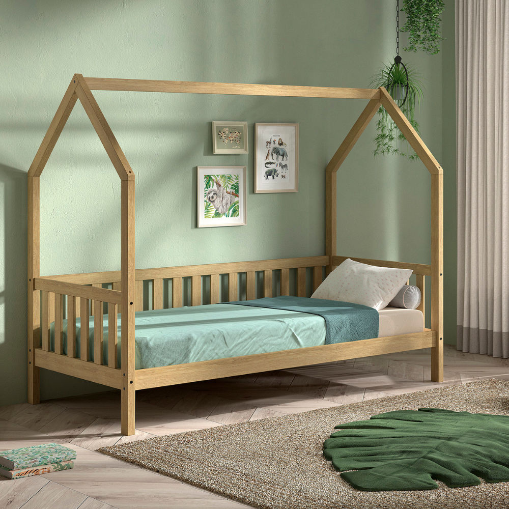The Cabane House Bed 90 x 200cm in Oak pine features a playful design, side railing, natural finish, fall protection with solid wood & slat base included
