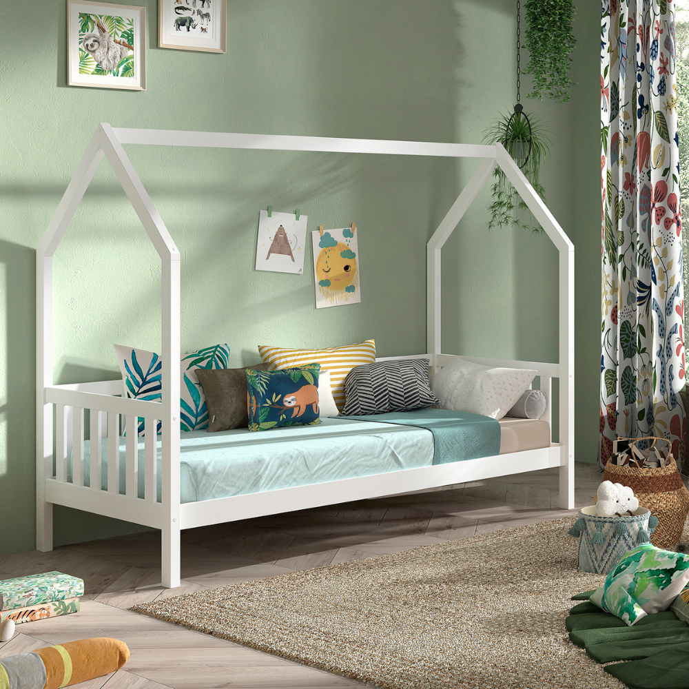 The Cabane House Bed 90 x 200cm in White pine features a playful design, side railing, fall protection and charm with solid wood & slat base included