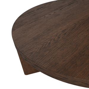 The California Round Coffee Table is crafted from oak and rubberwood veneer with a sleek, natural finish, stylish for any room.