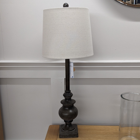 The Calven Grey Table Lamp 82cm offers a classic design, grey base and cream shade making this a versatile addition that adds style and light to any room