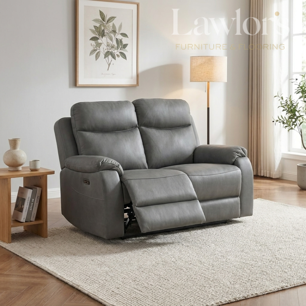Black 2 seater recliner sofa in a modern living room
