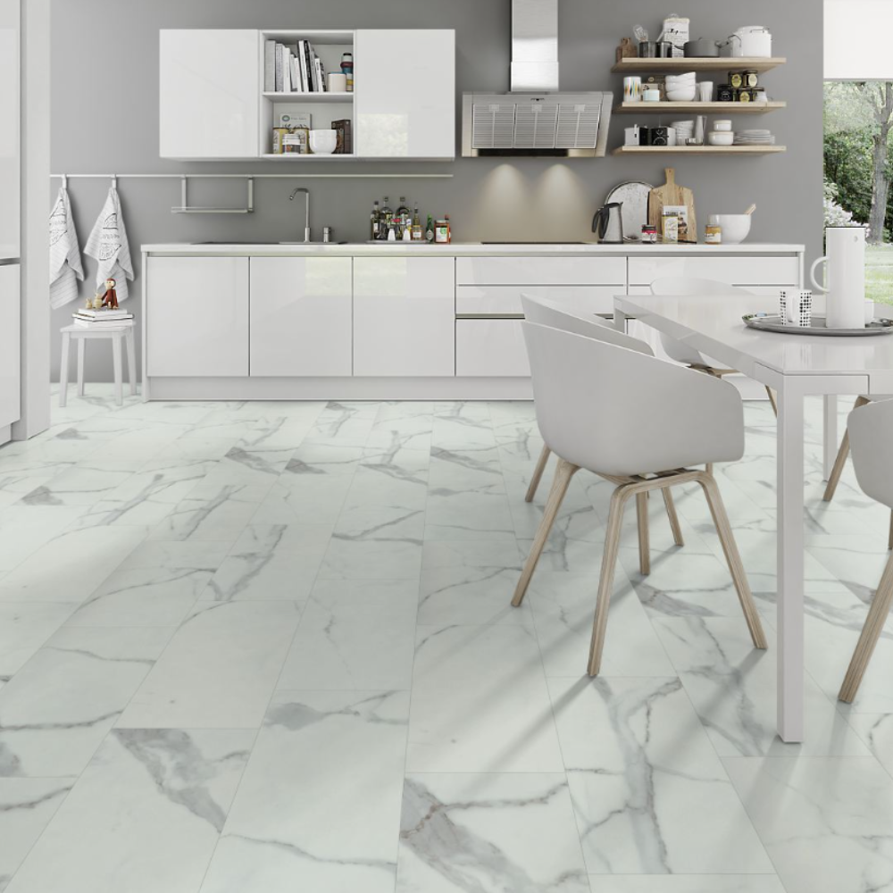 White marble-look floor tiles with gray veining in a modern kitchen setting.