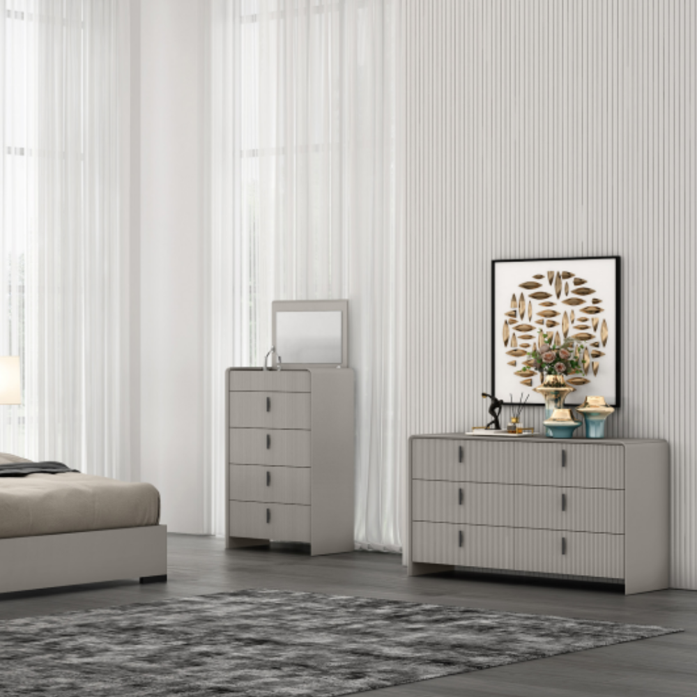 The Cavelli 6 Drawer Chest in Flannel Grey showcases a stylish ribbed design, offers six generous drawers and boasts a refined contemporary finish.