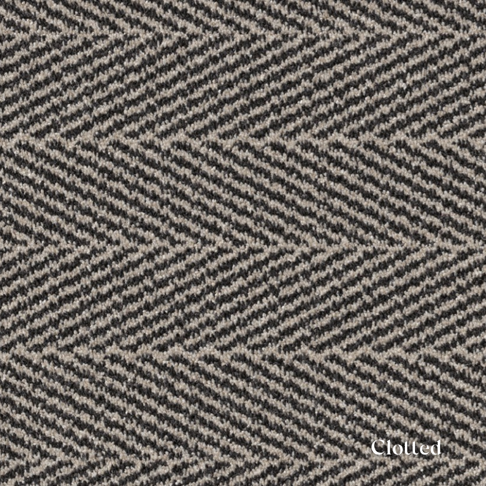 Textured fabric with a zigzag pattern in black and beige