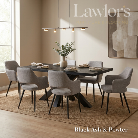 Dining room with a black dining table and 6 grey chairs set