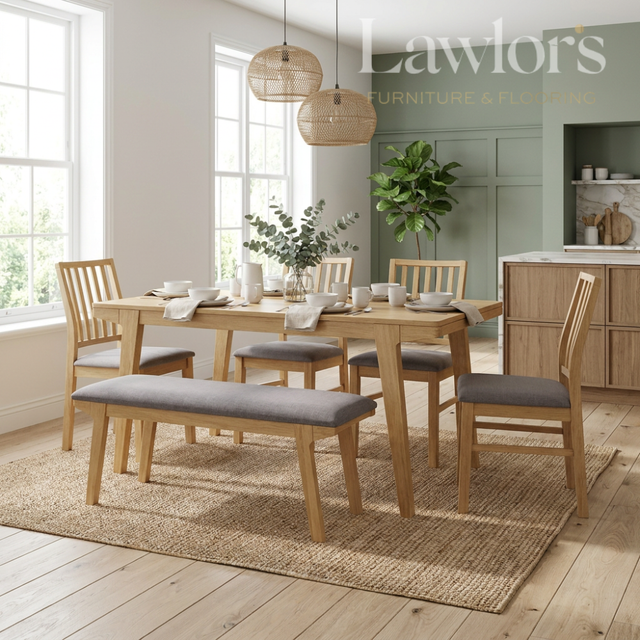 Dining room with wooden table, chairs, and bench on a rug