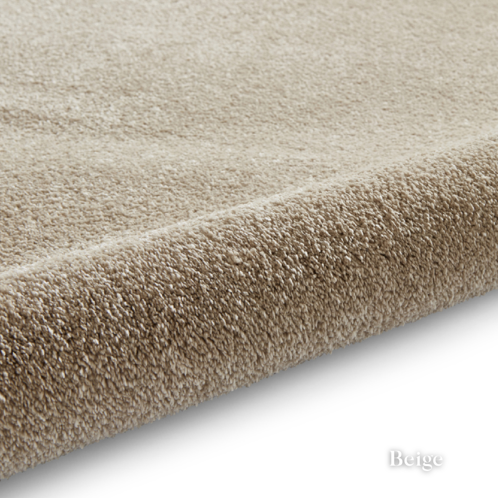 Brighten you room with the Cove Washable Collection Machine Made Rugs featuring washable design, soft shaggy pile and stain resistant