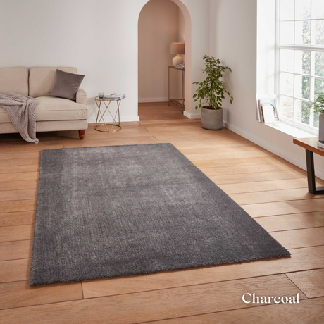 Brighten you room with the Cove Washable Collection Machine Made Rugs featuring washable design, soft shaggy pile and stain resistant