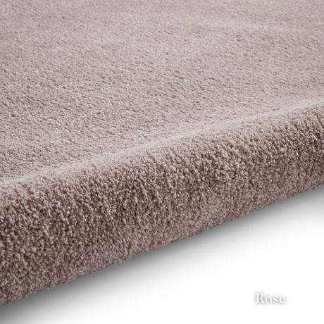 Brighten you room with the Cove Washable Collection Machine Made Rugs featuring washable design, soft shaggy pile and stain resistant