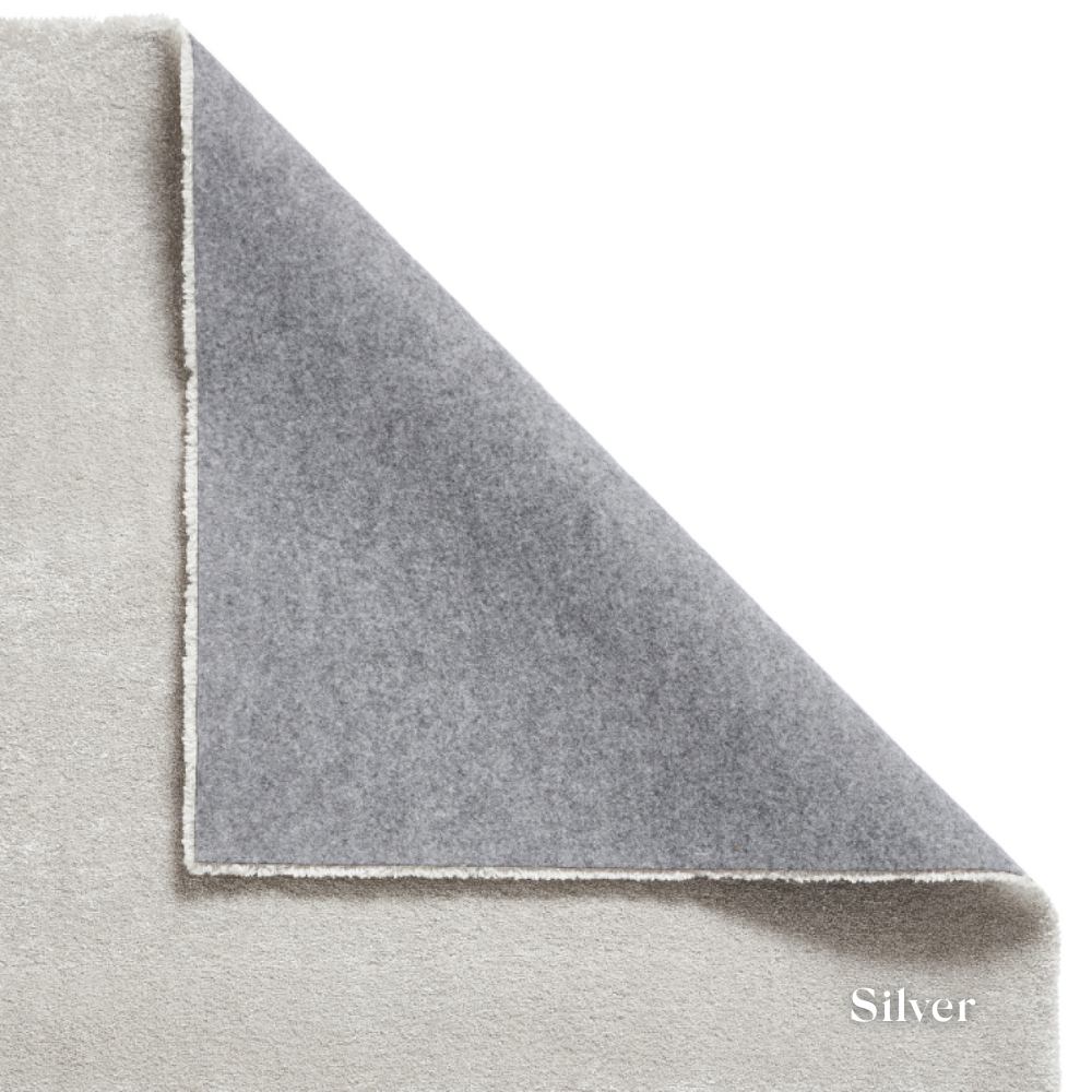 Brighten you room with the Cove Washable Collection Machine Made Rugs featuring washable design, soft shaggy pile and stain resistant